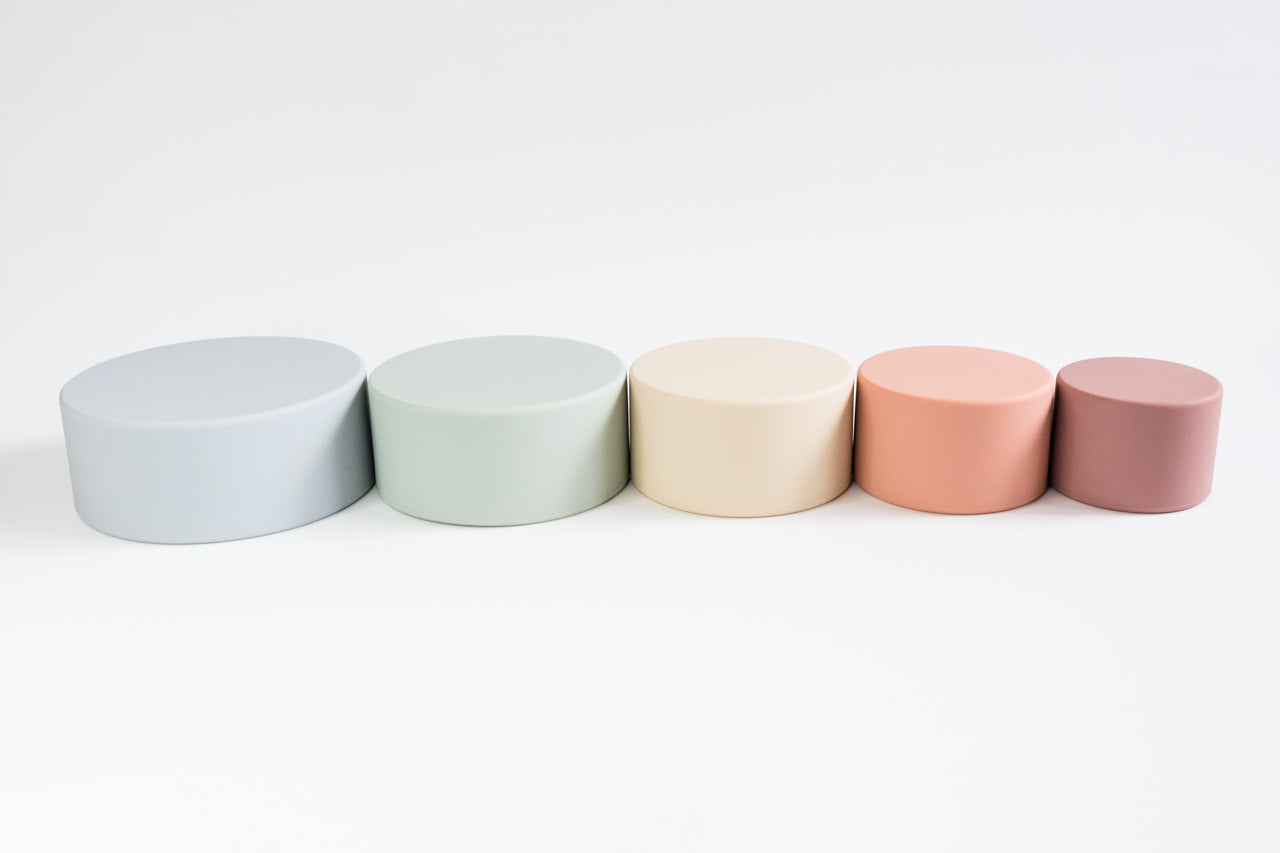rainbow stacking cups stacked next to each other