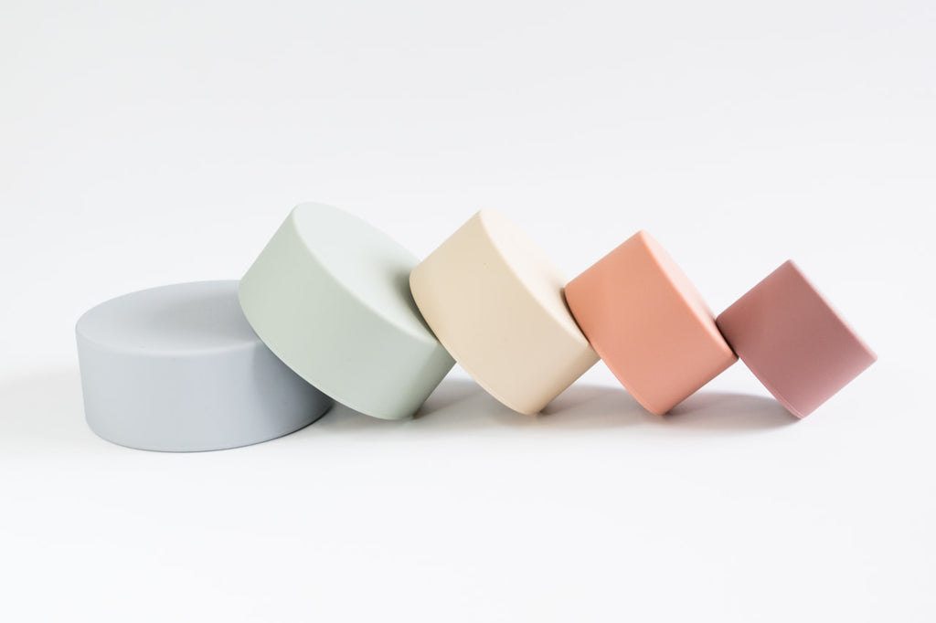 rainbow stacking cups tipped over
